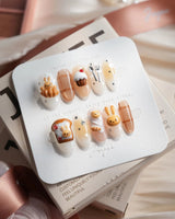 Caramel Miffy bunny dessert press-on nails in medium oval shape