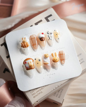 Caramel Miffy bunny dessert press-on nails in short stiletto shape