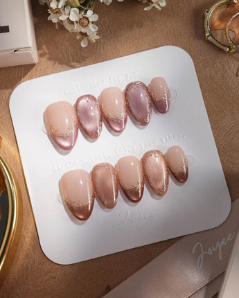 Caramel Petal press-on nails with rose chrome French styling and delicate gold baroque accents