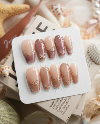 Caramel Petal medium coffin press-on nails with warm coffee and caramel brown fall tones