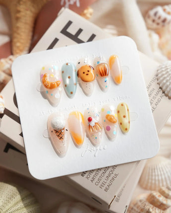 Caramel Toast bakery press-on nails in medium almond shape