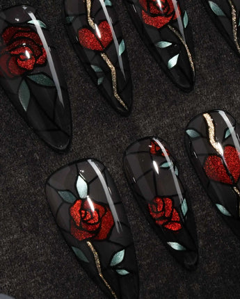Cathedral Rose gothic press on nails with red glitter roses, hearts and mint leaves in black stained glass lines on a smoky sheer base - image 1