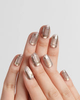 Champagne Check handmade press-on nails featuring Champagne Nude Brown, Metallic Plaid, Glitter Lines & Cat-eye Shimmer.