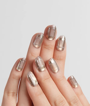 Champagne Check handmade press-on nails featuring Champagne Nude Brown, Metallic Plaid, Glitter Lines & Cat-eye Shimmer.