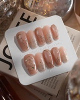 Champagne Nova nails in medium coffin — Icy Nude Pink &