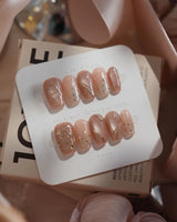 Champagne Nova nails in short coffin — Icy Nude Pink &