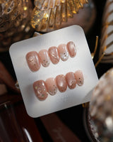 Champagne Nova nails in short oval — Icy Nude Pink &