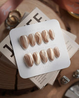Champagne Ribbons nails in extra short almond — Champagne Nude Gold, Silky