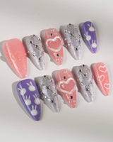 Charming Glam Usagi medium stiletto nails with co-created cute glam styling