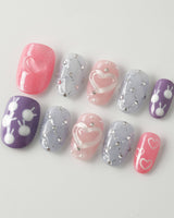 Charming Glam Usagi short oval nails with playful co-creator design and glossy finish