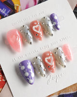 Charming Glam Usagi short stiletto nails with cute glam styling and handmade polish