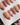 Cherry blossom press-on nails with gold leaf accents	