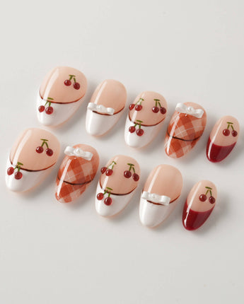 Cherry Miss press-on nails in extra short almond shape — Red White French, 3D Bow & Cherry.