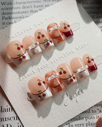 Cherry Miss press-on nails in extra short coffin shape — Red White French, 3D Bow & Cherry.