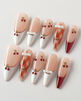 Cherry Miss press-on nails in long stiletto shape — Red White French, 3D Bow & Cherry.