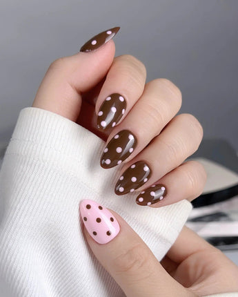 Berry Cocoa press-ons with warm cocoa color, pink dotted accents, and cute glossy nail art