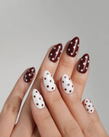 Choco Pop nail art close-up showing Wine Red & Creamy White Contrast, Retro Polka Dots. details