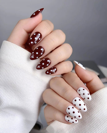 Choco Pop press-ons with wine red polish, creamy white base, and bold polka dots