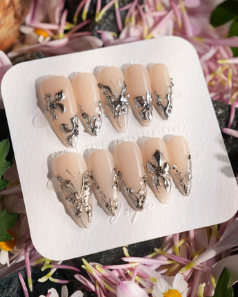 Chrome Rebellion press-on nail set — Nude, 3D Silver Butterflies & Liquid Metal. design, hand-painted with real gel polish