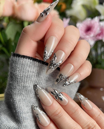 Chrome Rebellion press-on nails — Nude, 3D Silver Butterflies & Liquid Metal. handmade nail art by Joyee Nails