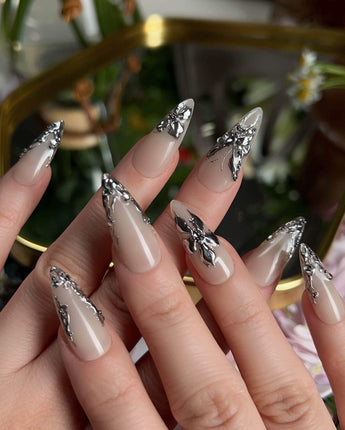 Chrome Rebellion press-on nails — Nude, 3D Silver Butterflies & Liquid Metal. handmade nail art by Joyee Nails