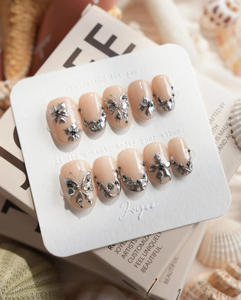 Chrome Rebellion Short Oval press on nails, handmade custom nails by Joyeenails