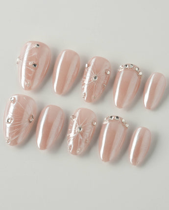 Chrome Wings press-on nails in extra short almond shape — chrome Icy Pink, Sparkling Rhinestone Fireworks.