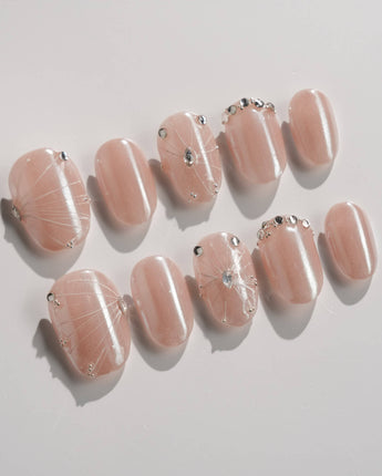 Chrome Wings press-on nails in extra short oval shape — chrome Icy Pink, Sparkling Rhinestone Fireworks.