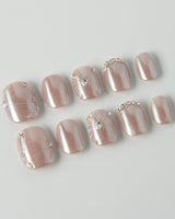 Chrome Wings press-on nails in extra short squoval shape — chrome Icy Pink, Sparkling Rhinestone Fireworks.