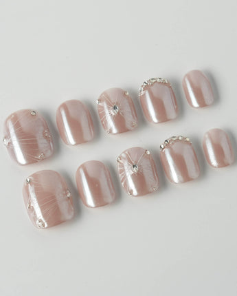 Chrome Wings press-on nails in extra short squoval shape — chrome Icy Pink, Sparkling Rhinestone Fireworks.
