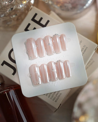 Chrome Wings press-on nails in medium square shape — chrome Icy Pink, Sparkling Rhinestone Fireworks.