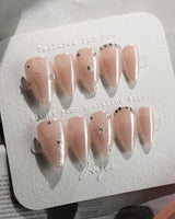 Chrome Wings press-on nails in short stiletto shape — chrome Icy Pink, Sparkling Rhinestone Fireworks.