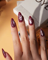 Claret leopard cat eye press on nails, deep wine red base with a rose gold shimmer band and hand-painted black leopard spots - image 5