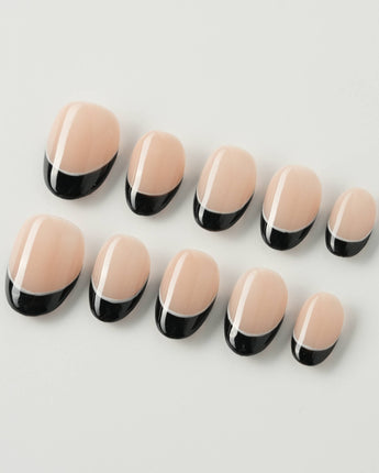 Classic Return - Ebony in extra short oval shape with black French tips and nude base