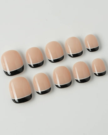 Classic Return - Ebony in extra short squoval shape with black French tips and white accents