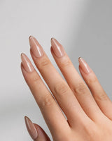 Clean Grace press-on nails in medium almond shape — gold french tip nails