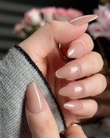 Clean Grace press-on nails in short almond shape — gold french tip nails