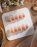 Clean Grace press-on nails in extra short coffin shape — gold french tip nails