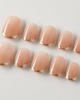 Clean Grace press-on nails in extra short squoval shape — gold french tip nails