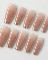 Clean Grace press-on nails in long coffin shape — gold french tip nails
