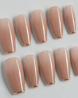 Clean Grace press-on nails in medium coffin shape — gold french tip nails