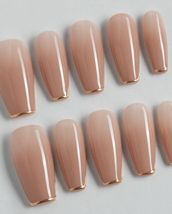 Clean Grace press-on nails in medium coffin shape — gold french tip nails