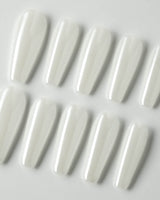 Clean Pearl press-on nails in long coffin shape — white chrome nails