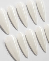 Clean Pearl press-on nails in long stiletto shape — white chrome nails