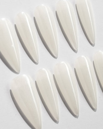Clean Pearl press-on nails in long stiletto shape — white chrome nails