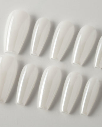 Clean Pearl press-on nails in medium coffin shape — white chrome nails