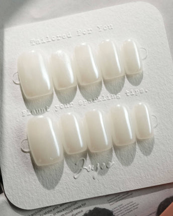 Clean Pearl press-on nails in short square shape — white chrome nails