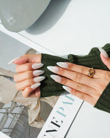 Clean Pearl nail art close-up showing white chrome nails details