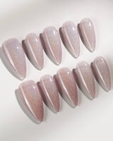 Clean Rainbow Cat-eye press-on nails in medium stiletto shape — pale pink cat eye nails