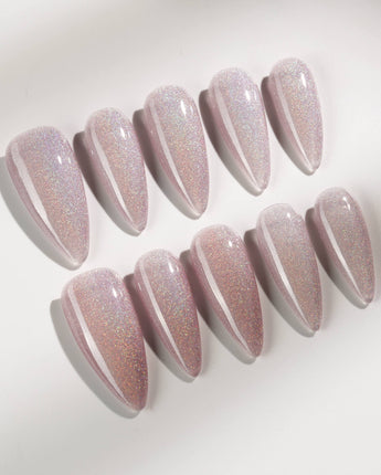 Clean Rainbow Cat-eye press-on nails in medium stiletto shape — pale pink cat eye nails